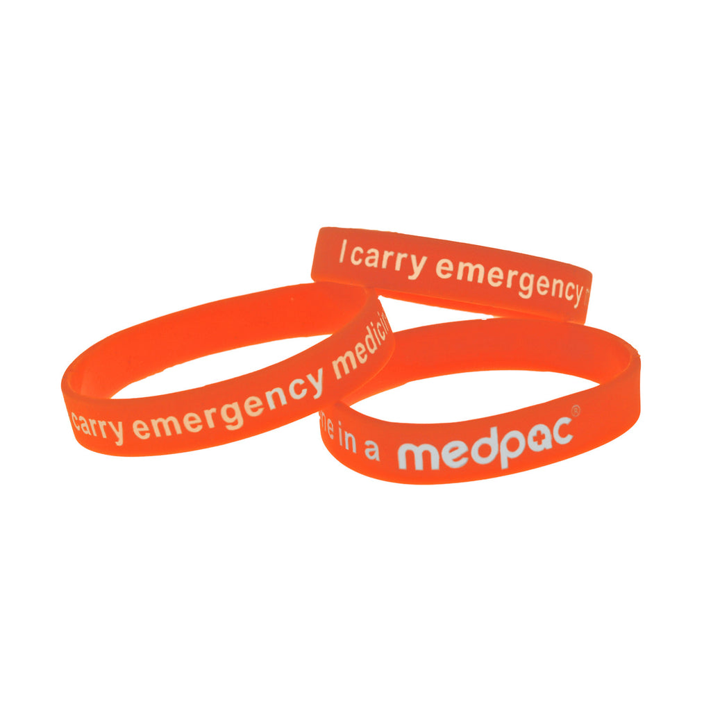 three medpac wristbands in different sizes with "I carry emergency medicine in a medpac" print