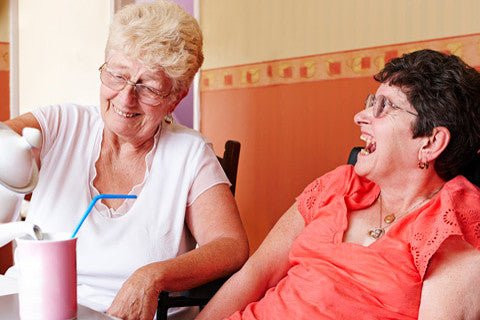 two women laughing