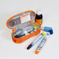 small orange insulated zip bag to hold medicines and ID card